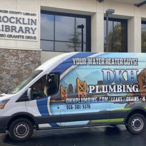 DKH Plumbing technician performing emergency plumbing repair
