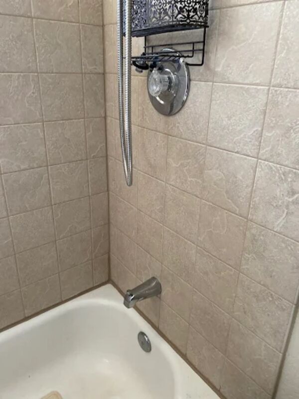 Shower and tub fixture installed by DKH Plumbing